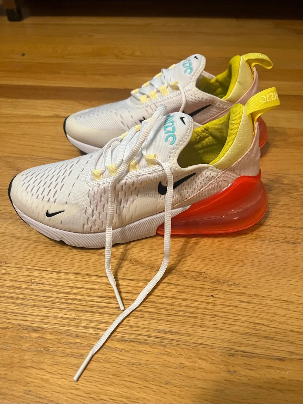 Nike White Sneakers with Yellow Liner and Orange Heel Air Unit